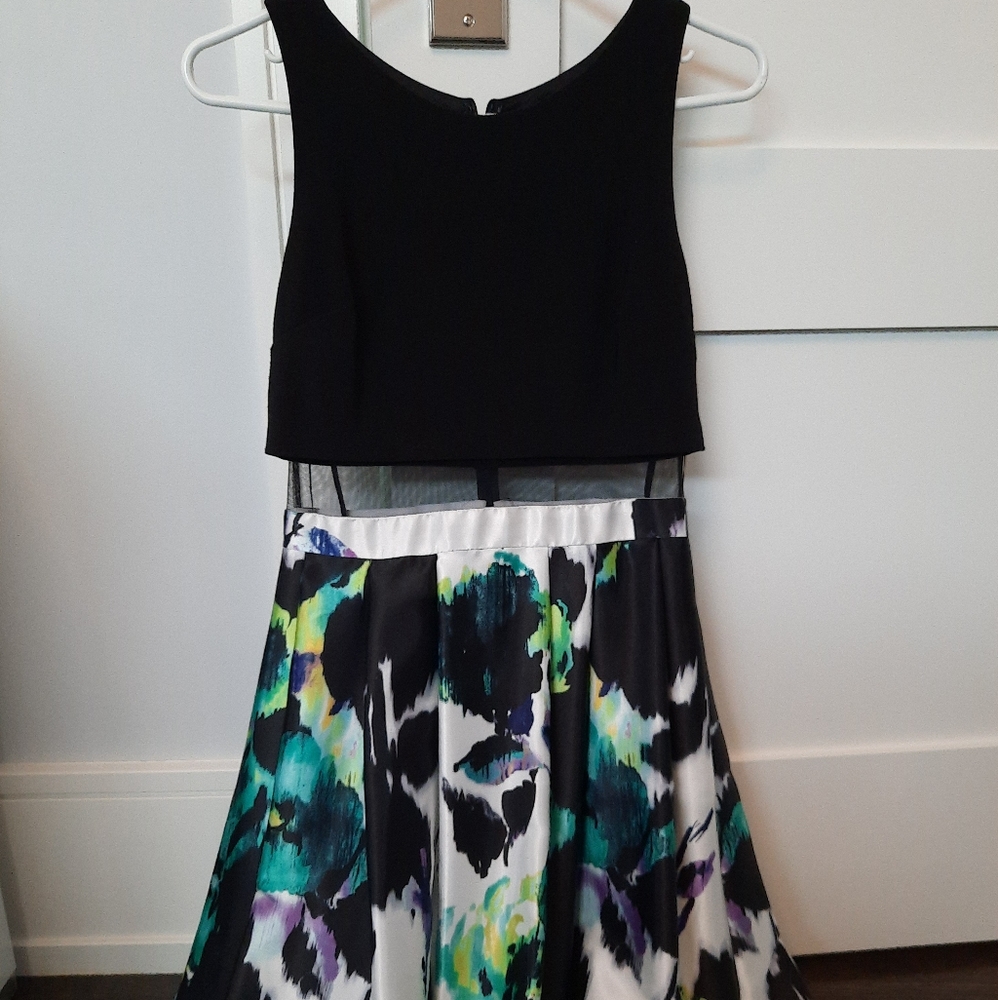 Black and floral dress with pockets at the side